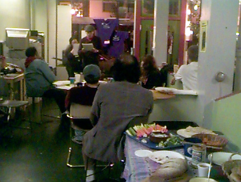 StreetWrites open mic, Michael Sloan at the microphone.