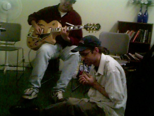 Tim Harris on guitar, Bob Redmond on harmonica.