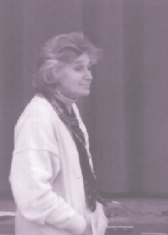 (Photo of Marion Sue Fischer reading at the first Homeless Women's Forum in Seattle)